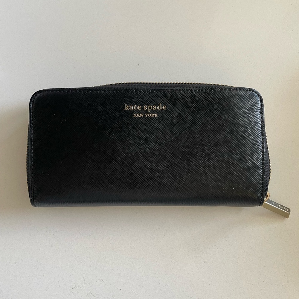 Black Kate Spade Wallet. Genuine Leather.  Pink satin lining.